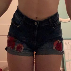 Rose pattern jean shorts.